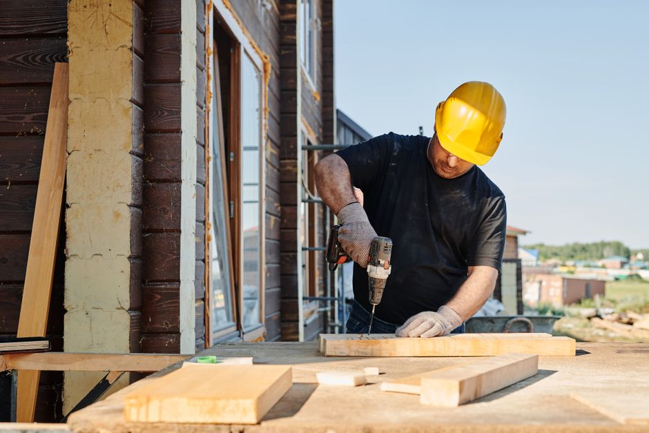 Home improvement contractor discussing bathroom remodel